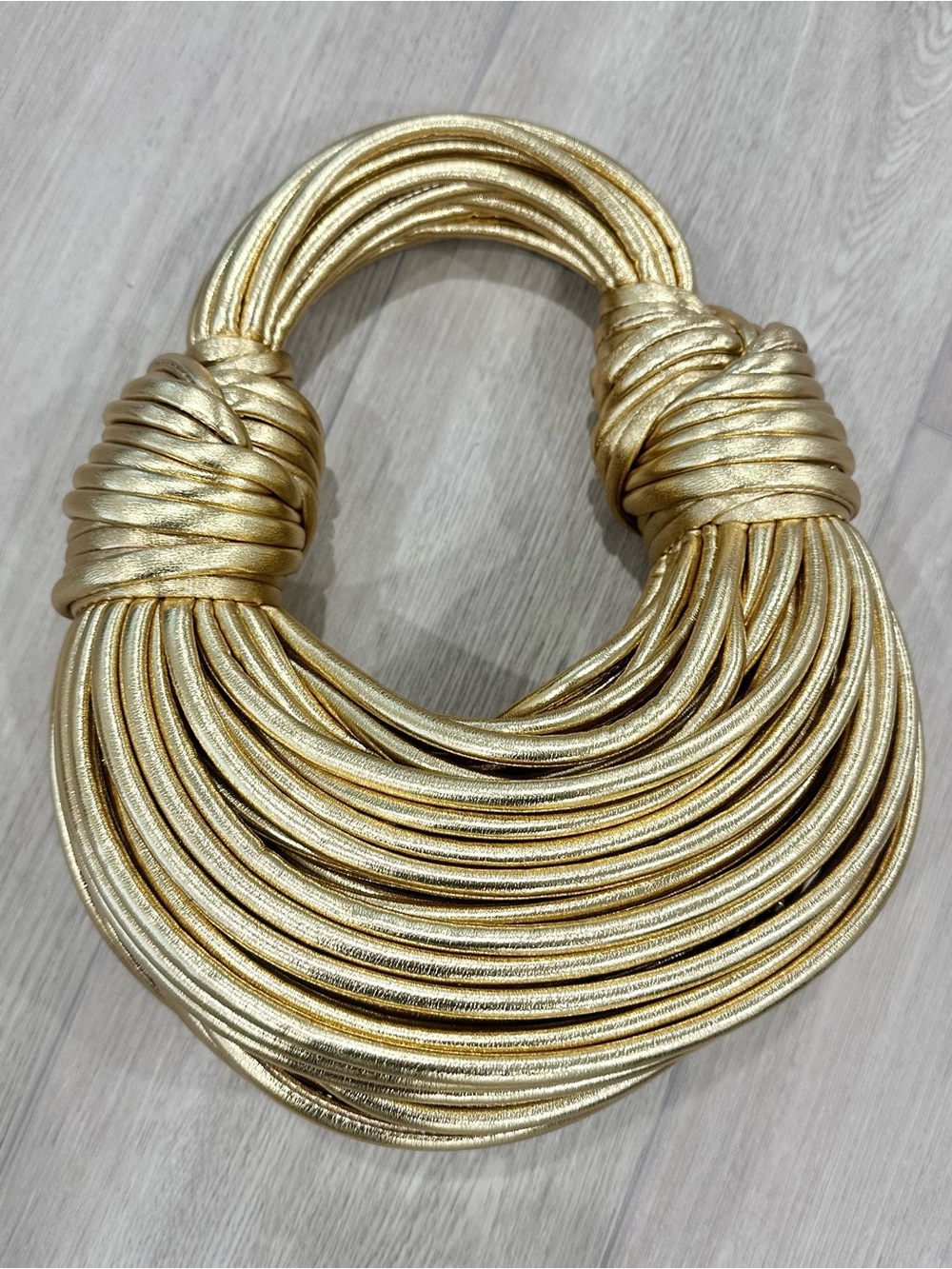 NWOT BOTTEGA VENETA leather double knot tubular mini spaghetti bag clutch gold - Picture 2 of 9